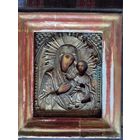 Икона в киоте под стеклом