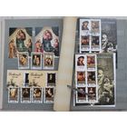 Альбом с марками Северной Кореи.