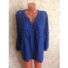 Рубашка насыщенно синего цвета на 52-54 размер, в темную полоску . Смотрится очень хорошо на фигурке, визуально ее вытягивает. Мягкая и приятная на ощупь ткань.