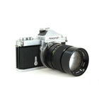 Фотоаппарат Nikon Nokomat FT с объективом Vivitar 2.8/135