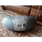 Музыкальный центр Panasonic в рабочем состоянии с пультом