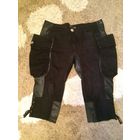 Стильные фирменные бриджи Rinascimento. Размер 52-54. По бокам вставки из натуральной кожи и большие карманы. Классная, интересная модель для смелой девушки. Длина72см, ПОталии50см. Состояние б/у вещи