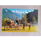 Этнография. Швейцария, Интерлакен. Конная повозка с девушками в традиционной одежде