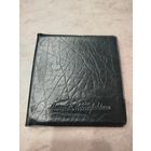 Альбом для монет с двумя видами ячеек.