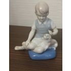 Фарфлровая фигурка мальчик