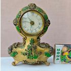 Часы рабочие , музыка Швейцария , стрелка будильника не переводится.