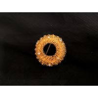 Брошь из плетёной проволоки