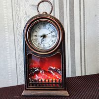 Декоративный небольшой электрический камин с часами.