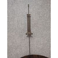 Маятник от старинных настенных часов