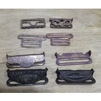 Зажимы и регуляторы от подтяжек.