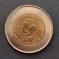 Португалия 100 эскудо 1999 г. ЮНИСЕФ. Ошибка в написании страны. Portugusa вместо Portuguesa