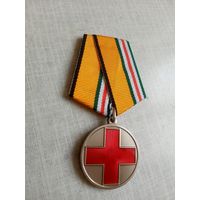 Медаль. За помощь в бою.
