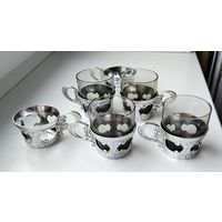 Подстаканники маленькие ( 6 шт. ) и 4 стакана.