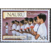 Марка из серии 1984г. Науру "Рождество. Дети со свечами в Кайзер колледже" MNH