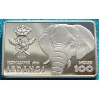Королевство Седанг.  100 моук  2025 год  "Слоны"  UNUSUAL  Материал: Латунь, покрытая серебром  Тираж: 120 шт
