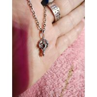 Серебряный кулон серебряной цепочкой . Описание на фото