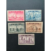 Польша 1945 Неполная серия марок "Взгляд из Варшавы: до и после ее разрушения" (гашение без клея, на нескольких есть следы наклеек) Mi.414-415, 417-419 каталог 1.90 евро