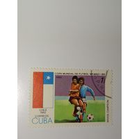 Куба 1985 Игровой момент матча, а также флаг Чили с упоминанием чемпионата 1962 года в Чили (Chile 1962).