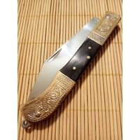 Новый нож золотистый складной