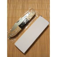 Нож золотистый новый складной