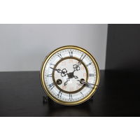 Старинный, часовой механизм с эмалевым циферблатом на 24 часа, ключ в комплекте.