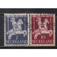 Нидерланды 1946 Вып Для детей Мальчик на карусели #472,475