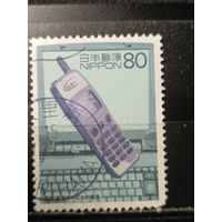 Япония, 2000. Внедрение мобильной связи