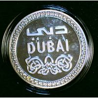 Сувенирный жетон (медаль), посвященная Дубаю и изображающая небоскреб Бурдж-Халифа, самое высокое здание в мире