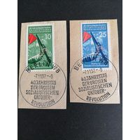 ГДР 1957 Две вырезки с марками серии "40 лет Октябрьской революции в России" (спецгашение) Mi.601-602 каталог 1.00 евро