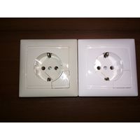Розетка Legrand 2К+З немецкий стандарт . С катапультой