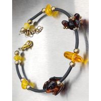 Лот: браслет и кулон с янтарем.