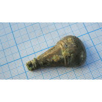 Половинка древней привески. Бронза, литье.