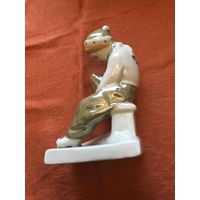 Артель  прогресс  девочка    одевающая  коньки