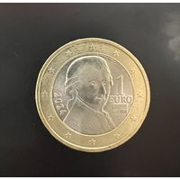 Монета евро