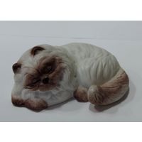 Статуэтка фарфоровая "Котик" 80-е годы Германия. Высота 3.5 см. Длина 7.5 см. Целая, без реставрации.