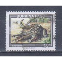 [1610] Буркина Фасо 1995. Фауна.Рептилии.Крокодил. Гашеная марка.
