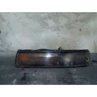 Поворотник левый Mazda 323 BG