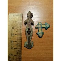 Часть нательного крестика и что-то