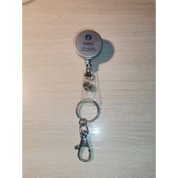 Брелок-ретрактор с логотипом Бельгийской полиции.