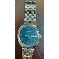 Винтажные советские  наручные часы , механизм 26 камней , циферблат синий с двойным календарем день недели и дата , часы заводяться идут , ТО часов не проводилось , ремешок целый кроме застежки .