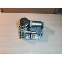 Механизм от музыкальной шкатулки с мелодией, рабочий, но немного подтормаживает.