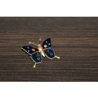 Декоративная брошь в виде бабочки.