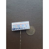 Значок Колдига