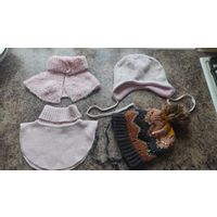 Две теплые шапки и две манишки на 4-5 лет. Хорошее состояние. Манишки розового цвета. Шапка в коричневых тонах Zara, очень хорошо садится, красиво смотрится. Розовая шапка отлично закрывает ушки. Цена