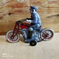 Игрушка мотоцикл.Жесть.