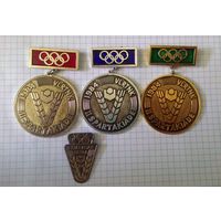 ДСО "Варпа", Латвийская ССР. II Спартакиада. Кулдига, 1984. Набор медалей за 1-3 места плюс знак мероприятия. С олимпийской символикой. Нечастый.