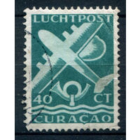 Нидерландские колонии - Кюрасао - 1947г. - авиация, авиапочта, 40 с - 1 марка - гашёная, есть небольшое повреждение перфорации снизу, немного погнут уголок (правый верхний) [Mi 261]. #3-WB-77-A-1