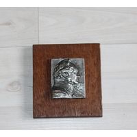 Настенное деревянное панно с оловянной вставкой.