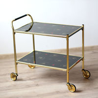 Сервировочный столик на колесиках / Бар на колесах. ГДР, 70-е годы. Стеклянные столешницы и латунные детали.