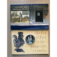 Латвия 2 Республика, 1 лат 2010 г., "Латвийская азбука",  KM# 110
